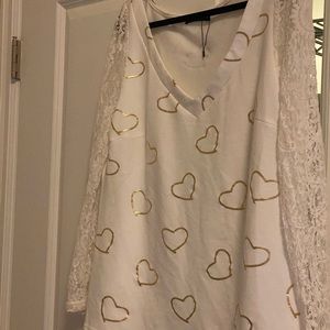 Sheilay, size medium; white feels like sweat-shirt in center and lace on sides